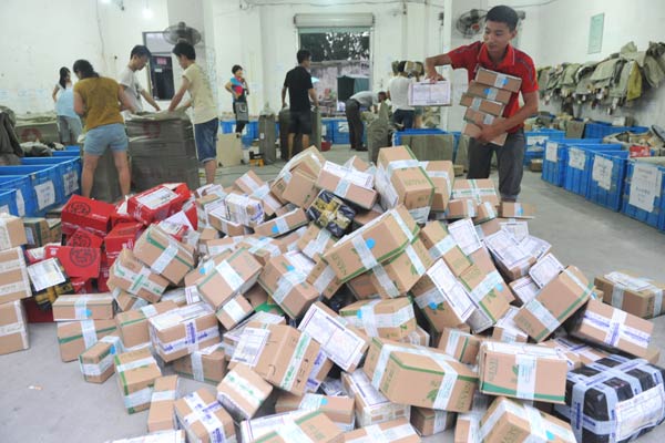 A kínai expressz csomagküldési piac hárommillió embert foglalkoztat, idén már több mint hatvanmilliárd csomagot szállítottak ki (kép forrása: China Daily)